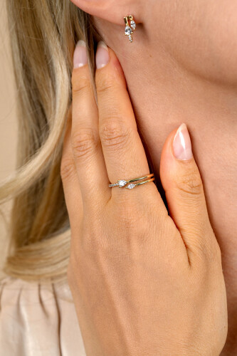 ZINZI gold plated silver multi-look ring (4mm wide) with pear-shaped and oval white zirconia ZIR2689Y