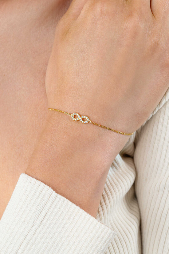 ZINZI gold plated silver bracelet with Infinity sign fully set with white zirconia 17-19cm ZIA2597Y